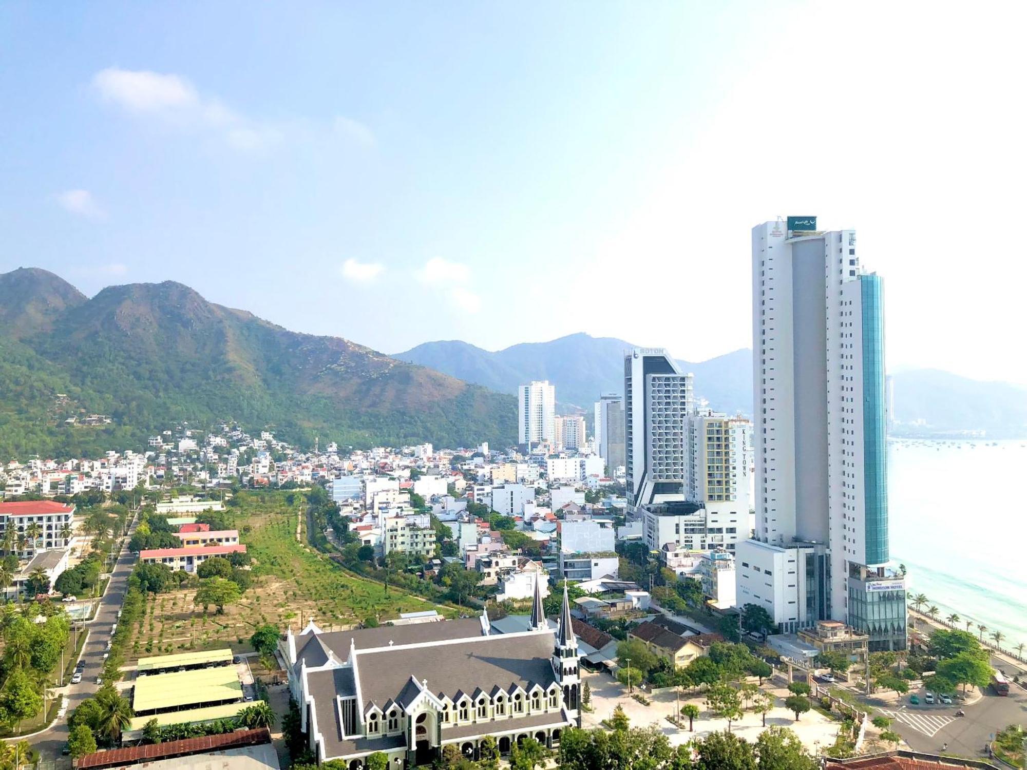 Scenia Bay Oceanfront By Housing Apartment Nha Trang Bagian luar foto